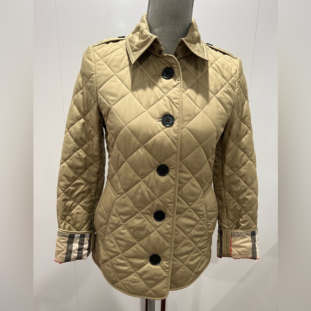 Beige Burberry Brit jacket.Size XS.Great condition.Barely worn looks brand new